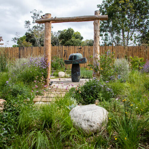 Natural materials and CA native plants add interest to a modern design.