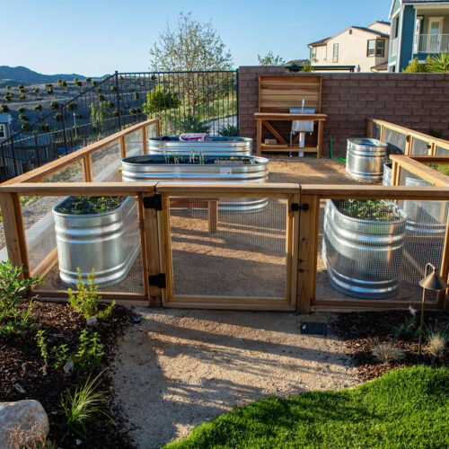 Custom fencing and and work bench with sink built by TOLD install team.